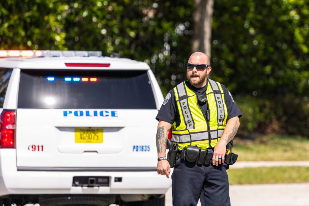 Cop in traffic vest